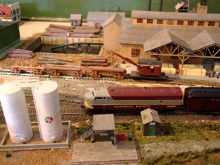 Sawmill, Tanks, and Log Cars Sawmill, Tanks, and Log Cars